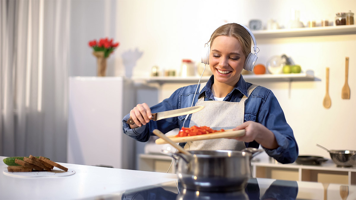 Cooking Wearing Headphones