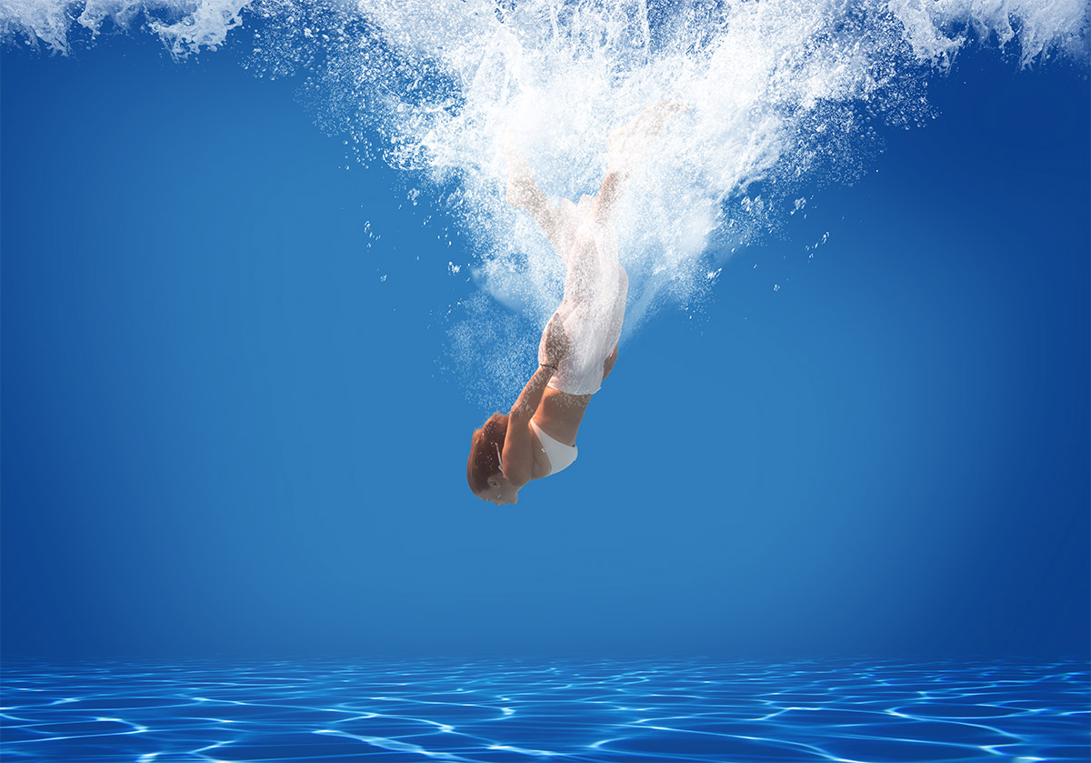 Woman Diving Into Pool