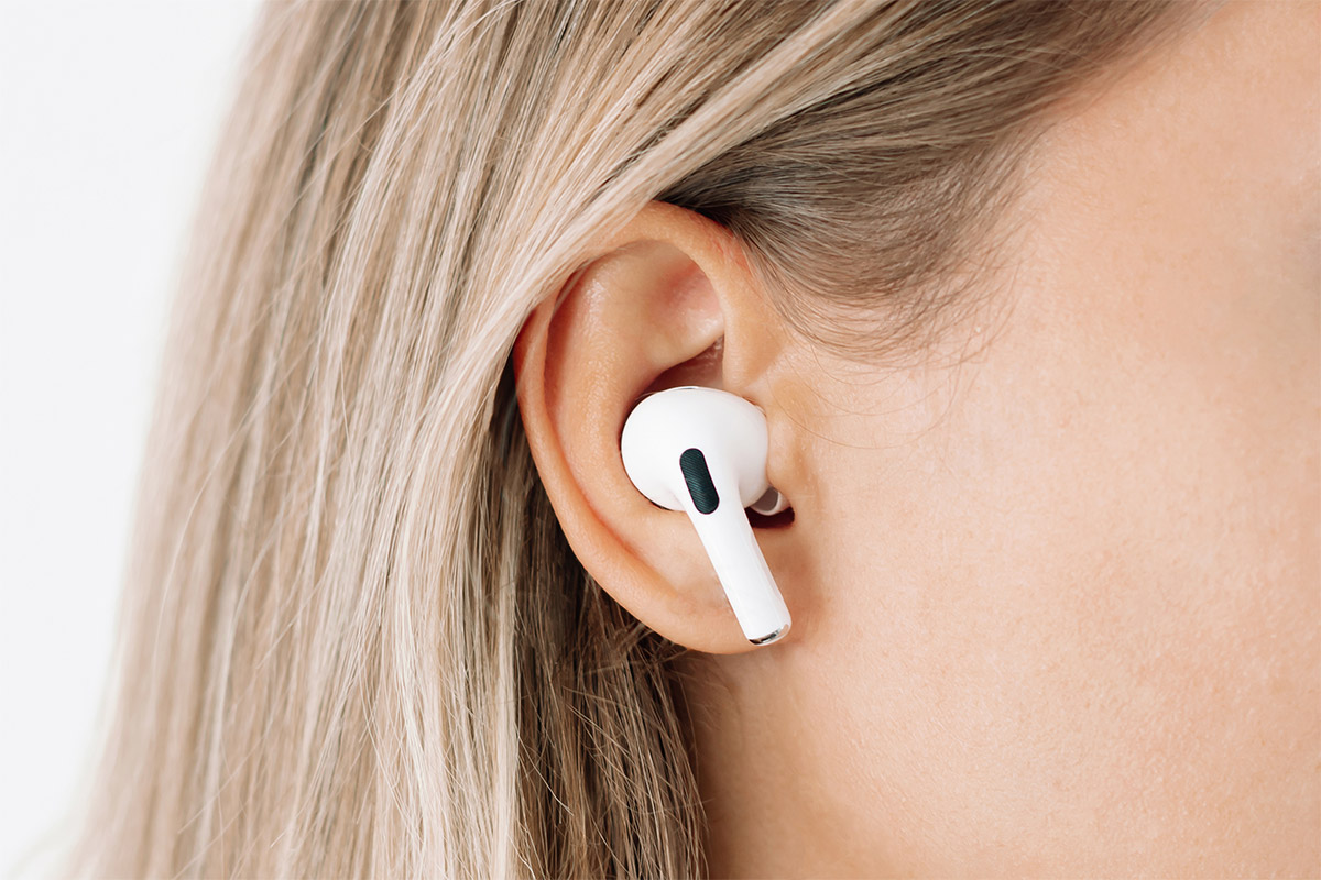 Woman wearing ipods side view